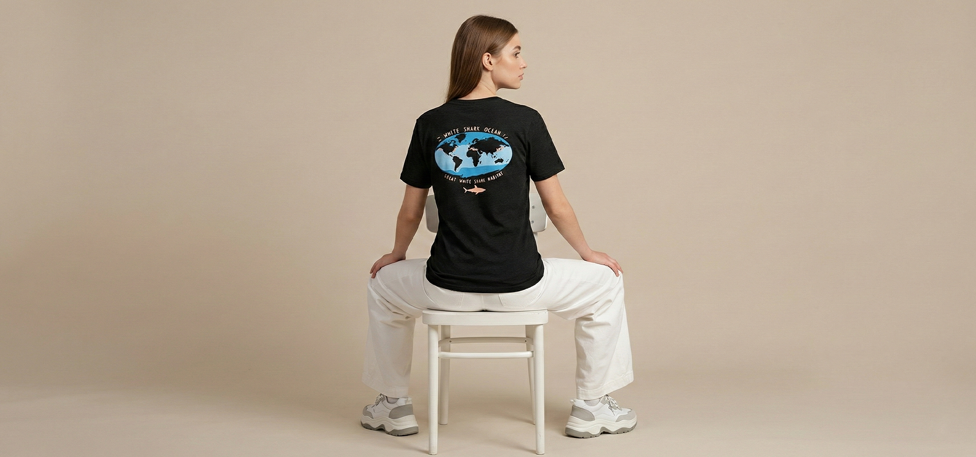 Man wearing shark graphic t-shirt, marine wildlife inspired streetwear design