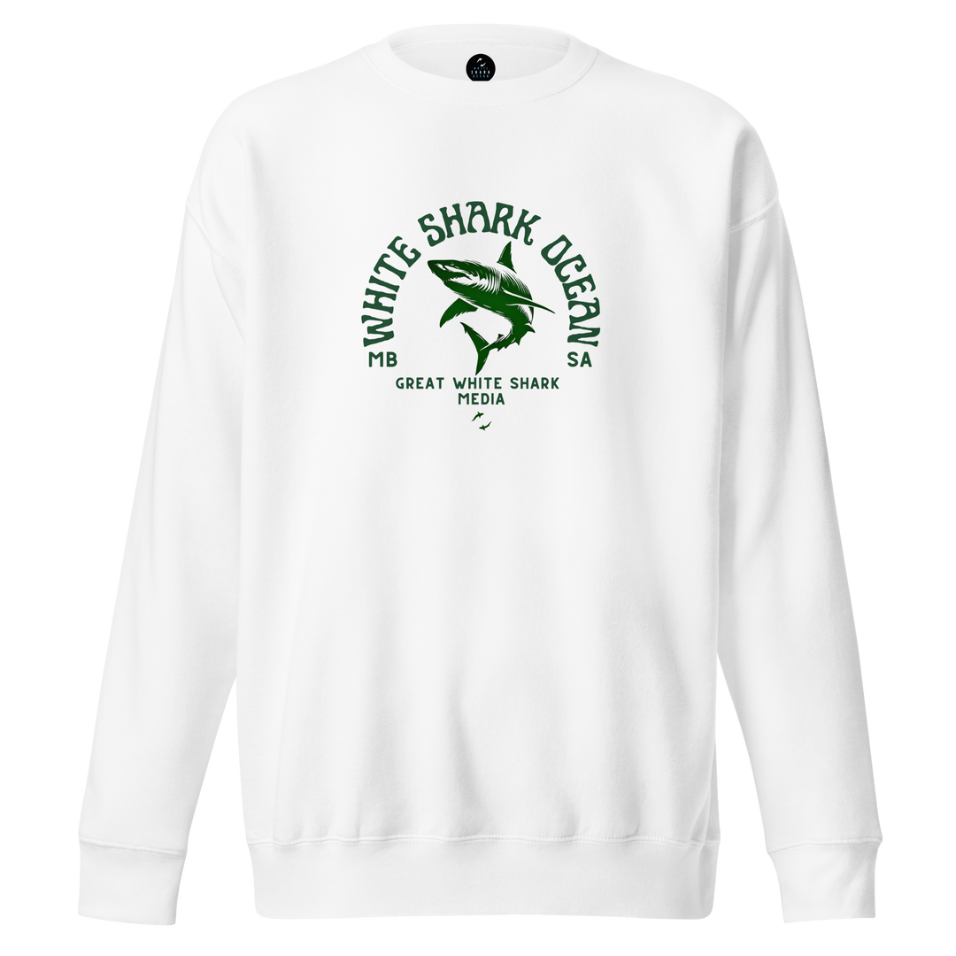 White sweatshirt with green shark graphic and text on a white background white shark ocean media