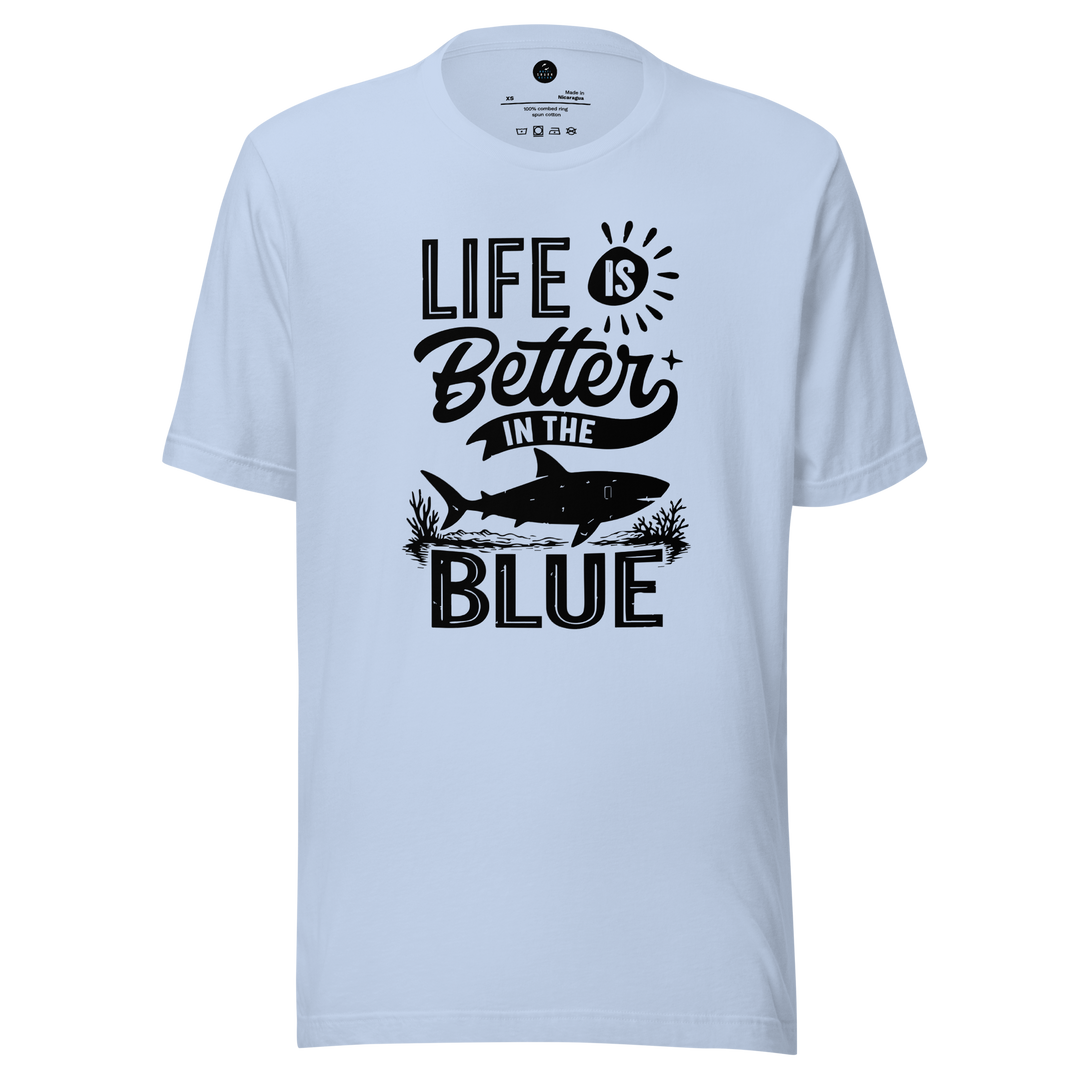 Light blue t-shirt with 'Life is Better in the Blue' text and shark graphic on a white background