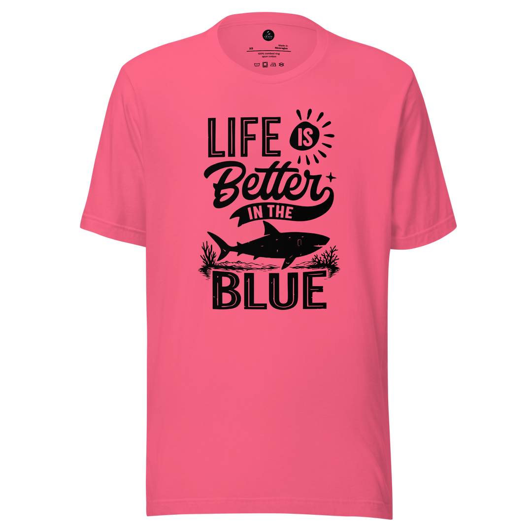 Pink t-shirt with 'Life is Better in the Blue' text and shark graphic on a white background