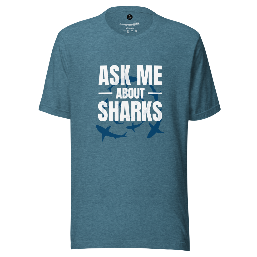 Blue t-shirt with 'Ask Me About Sharks' text and shark graphics on a white background