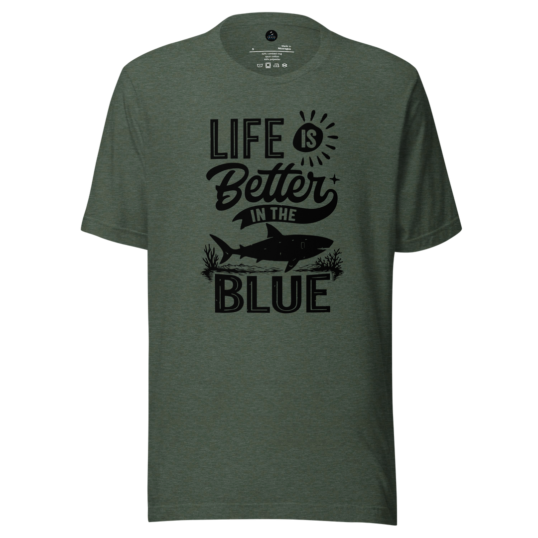 Green t-shirt with 'Life is Better in the Blue' text and shark graphic on a white background