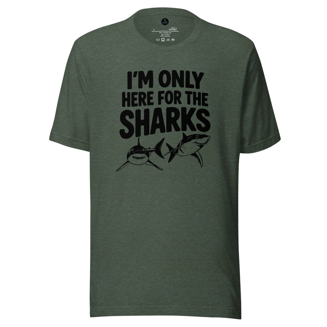 Green t-shirt with 'I'm only here for the sharks' text and shark graphics on a white background