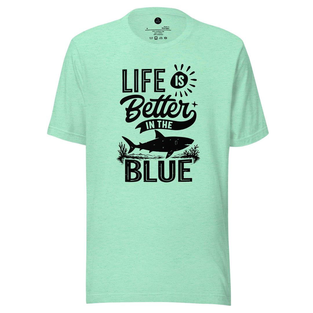 Mint green t-shirt with 'Life is Better in the Blue' text and shark graphic on a white background