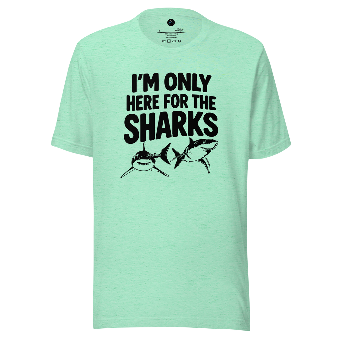 Mint green t-shirt with black text and shark graphics on a white background