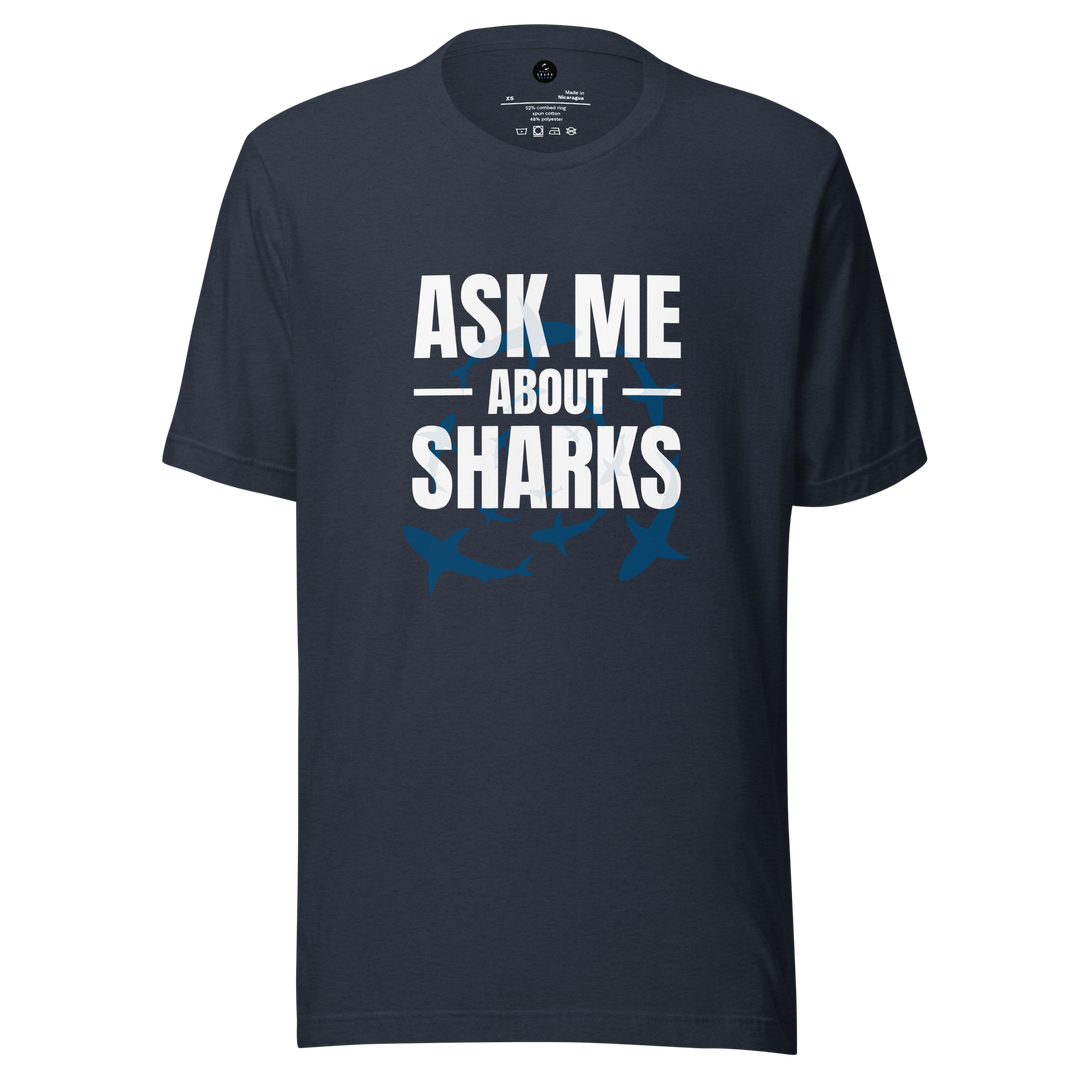 Navy blue t-shirt with 'Ask Me About Sharks' text and shark illustrations on a white background