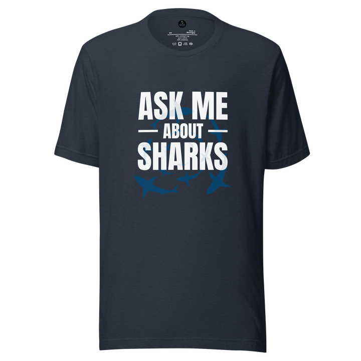 Navy blue t-shirt with 'Ask Me About Sharks' text and shark illustrations on a white background