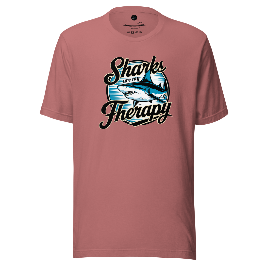 Pink t-shirt with 'Sharks are my Therapy' graphic design on a white background