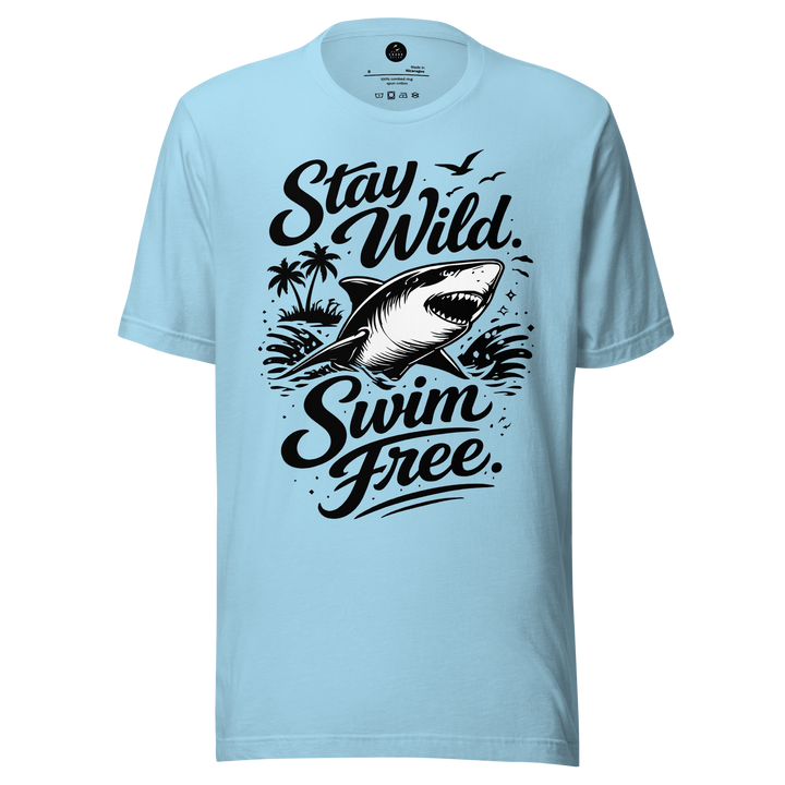 Light blue t-shirt with black shark graphic and text 'Stay Wild Swim Free' on a white background