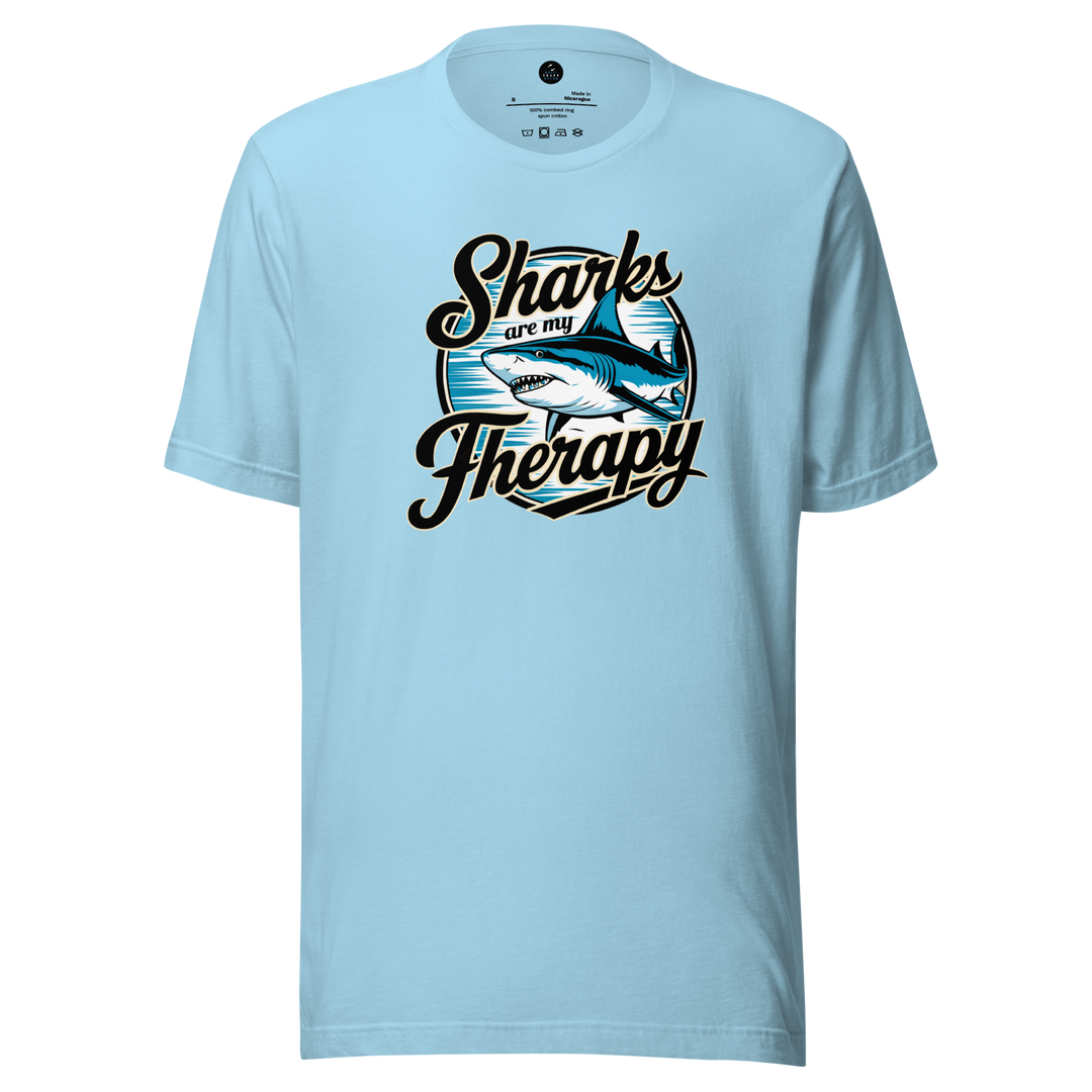 Light blue t-shirt with shark graphic and text on a white background