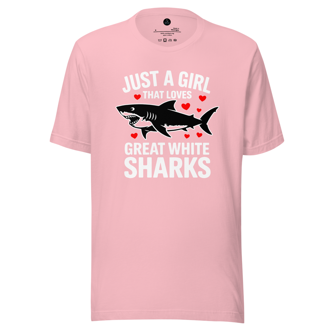 Pink t-shirt with shark graphic and "just a girl that loves great white sharks"text on a white background 