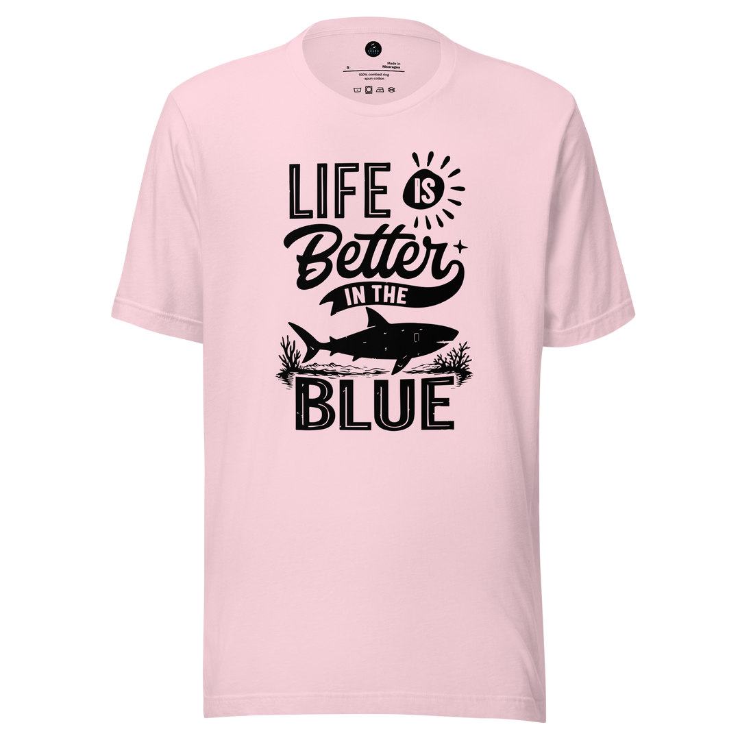 Pink t-shirt with 'Life is Better in the Blue' text and shark graphic on a white background