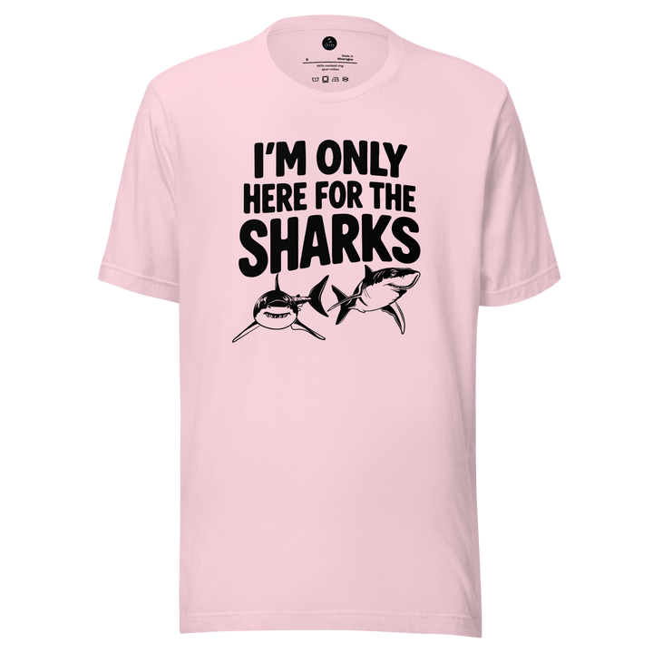Pink t-shirt with black text and shark graphics on a white background